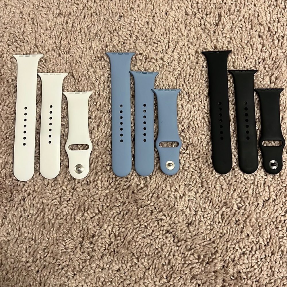 Apple Watch bands fit 44-45mm watch. Light blue, white, black, gently used